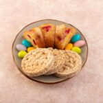 top-view-cherry-cake-slices-with-candies-biscuits-bright-pink-desk-cake-biscuit-sugar-sweet